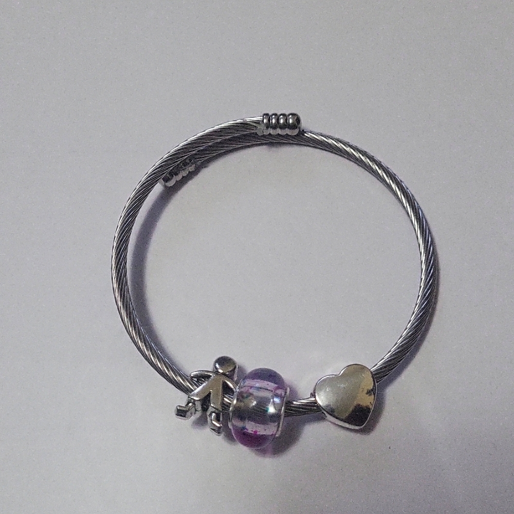 HAND CRAFTED Charm bracelet with heart, child and glass beads.